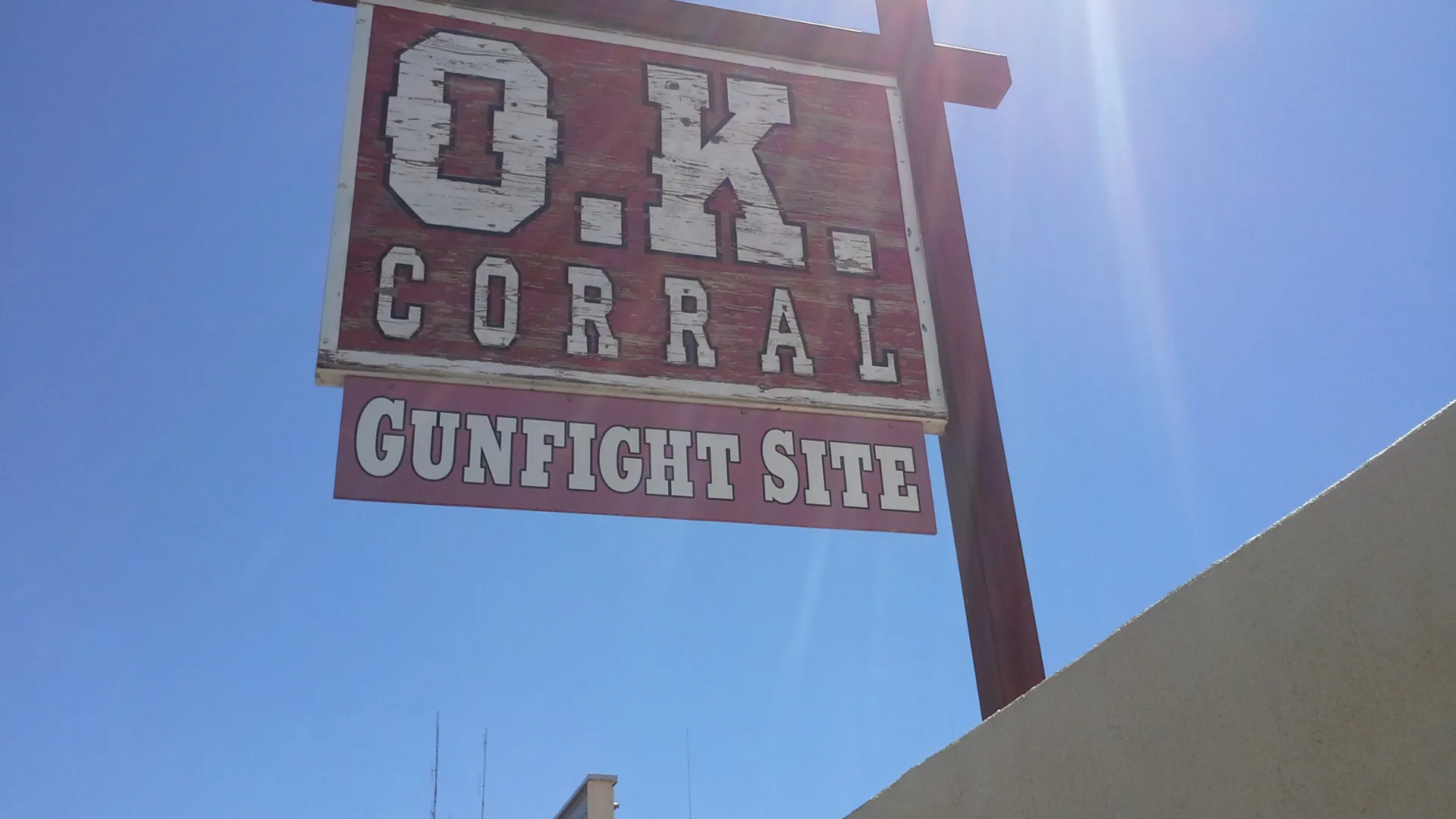 “Tombstone’s O.K. Corral: standing at the site where legends faced the dust.”