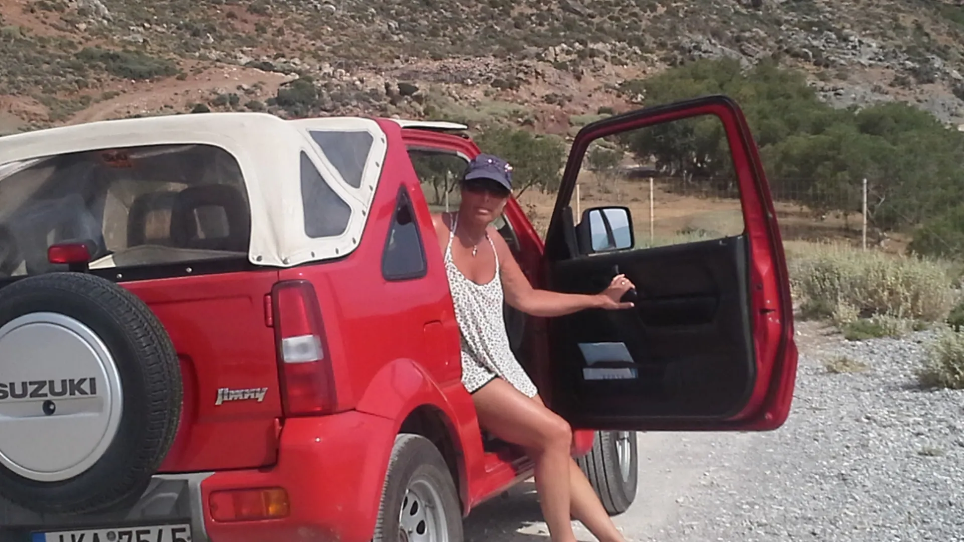 “Jane, ready to conquer Crete one dusty mountain road at a time — and clearly trusting this little Jimny far more than Alan ever did.”