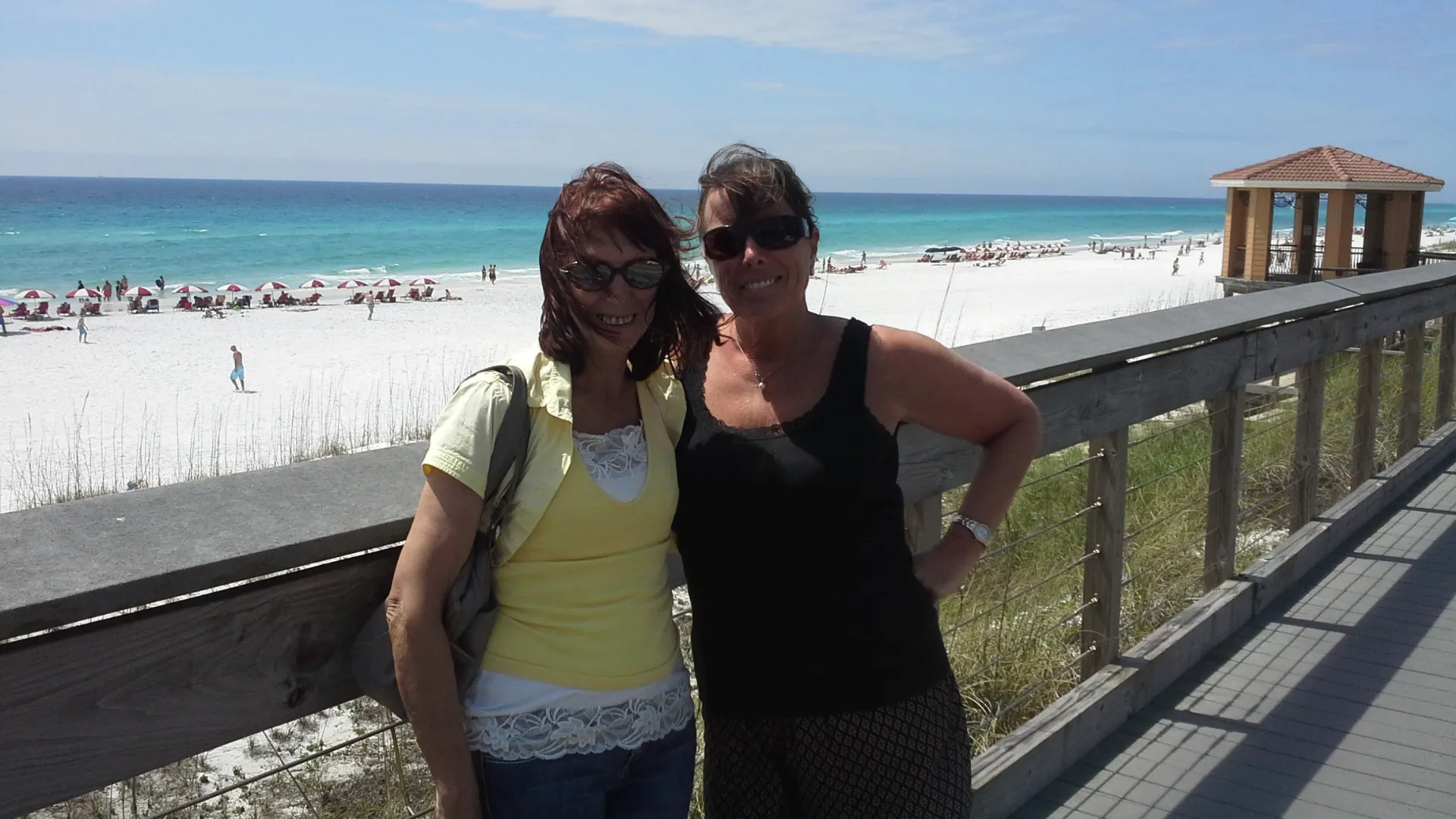 “A beachside reunion on the white sands of Destin.” Jane and Lesley